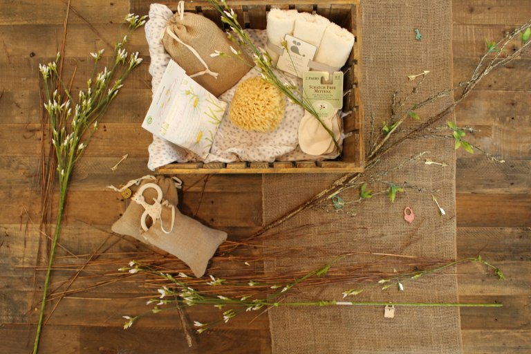 a gift basket for a surrogate with comfort items for the surrogate and the baby